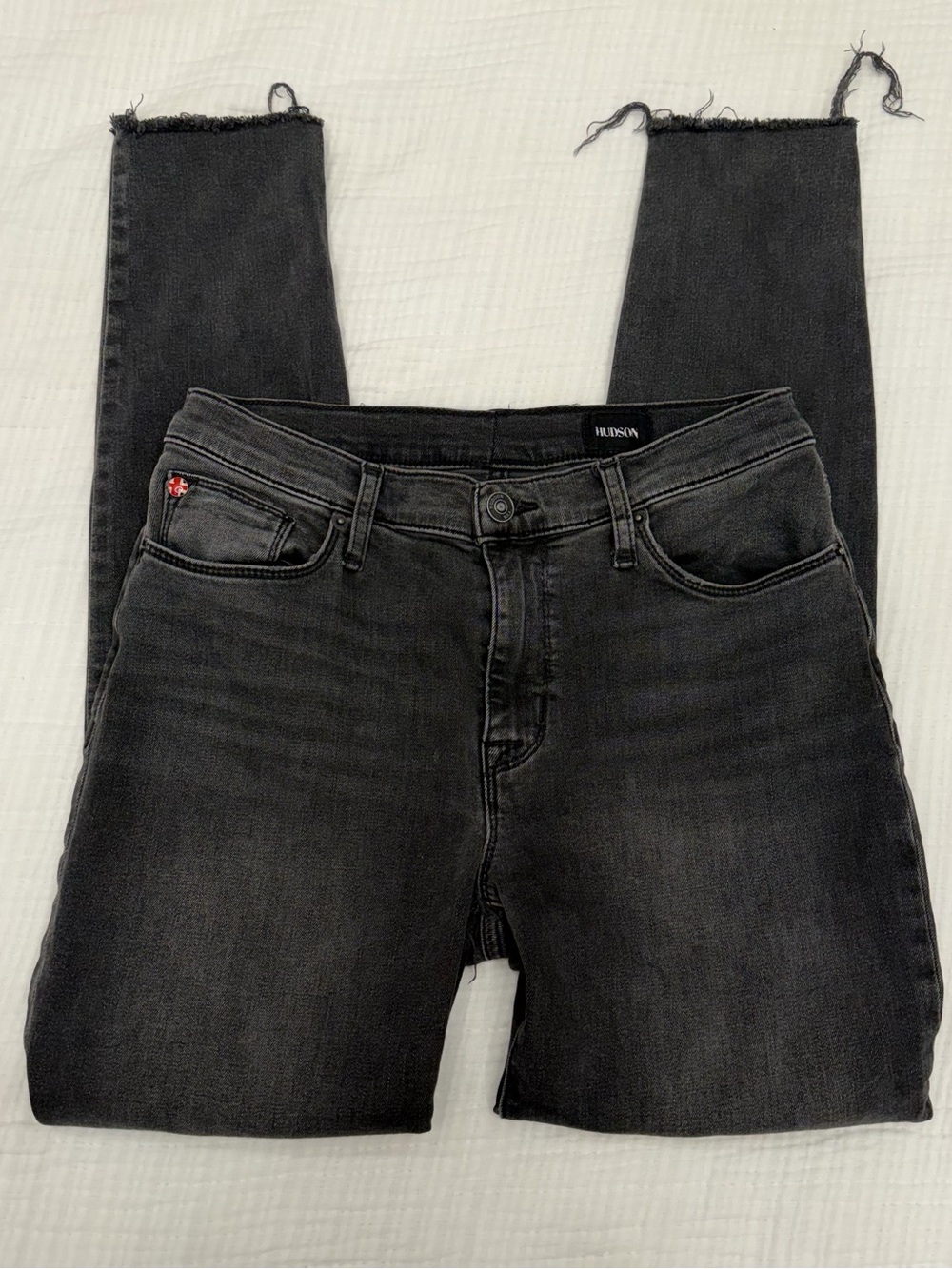 hudson mid rise raw hem skinny jeans